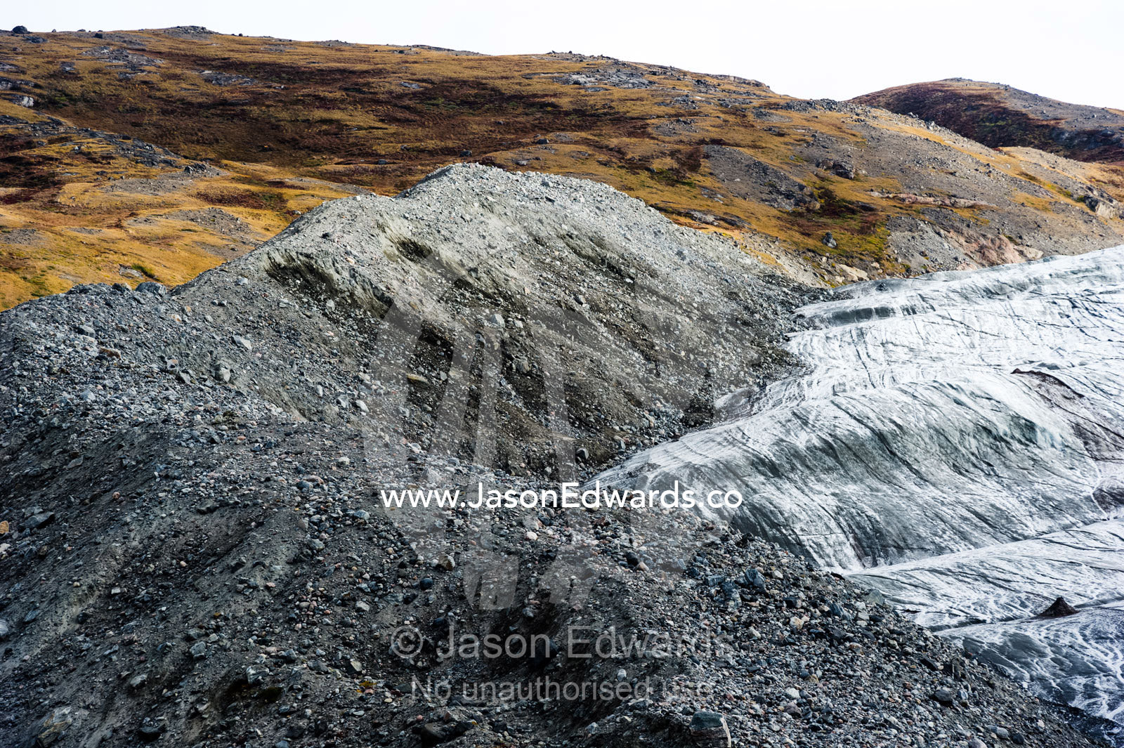 A pile of rock, sediment and silt debris deposited by the leading edge of a glacier. Russell Glacier, Greenland Ice Sheet, Qeqqata Municipality, Kangerlussuaq, Greenland.