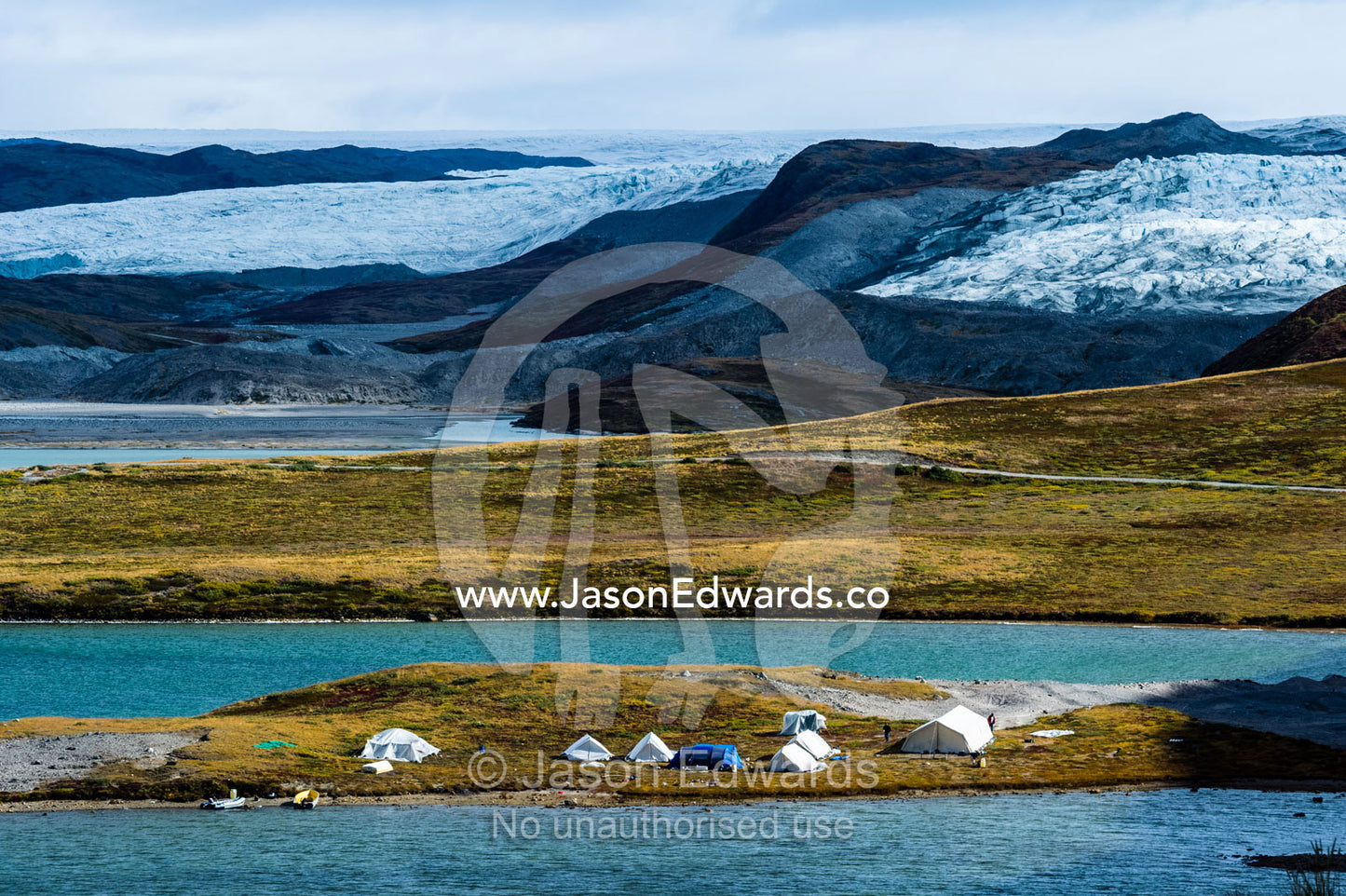 A student research camp site on the shores of a lake near the Greenland Ice Sheet. Russell Glacier, Greenland Ice Sheet, Qeqqata Municipality, Kangerlussuaq, Greenland.