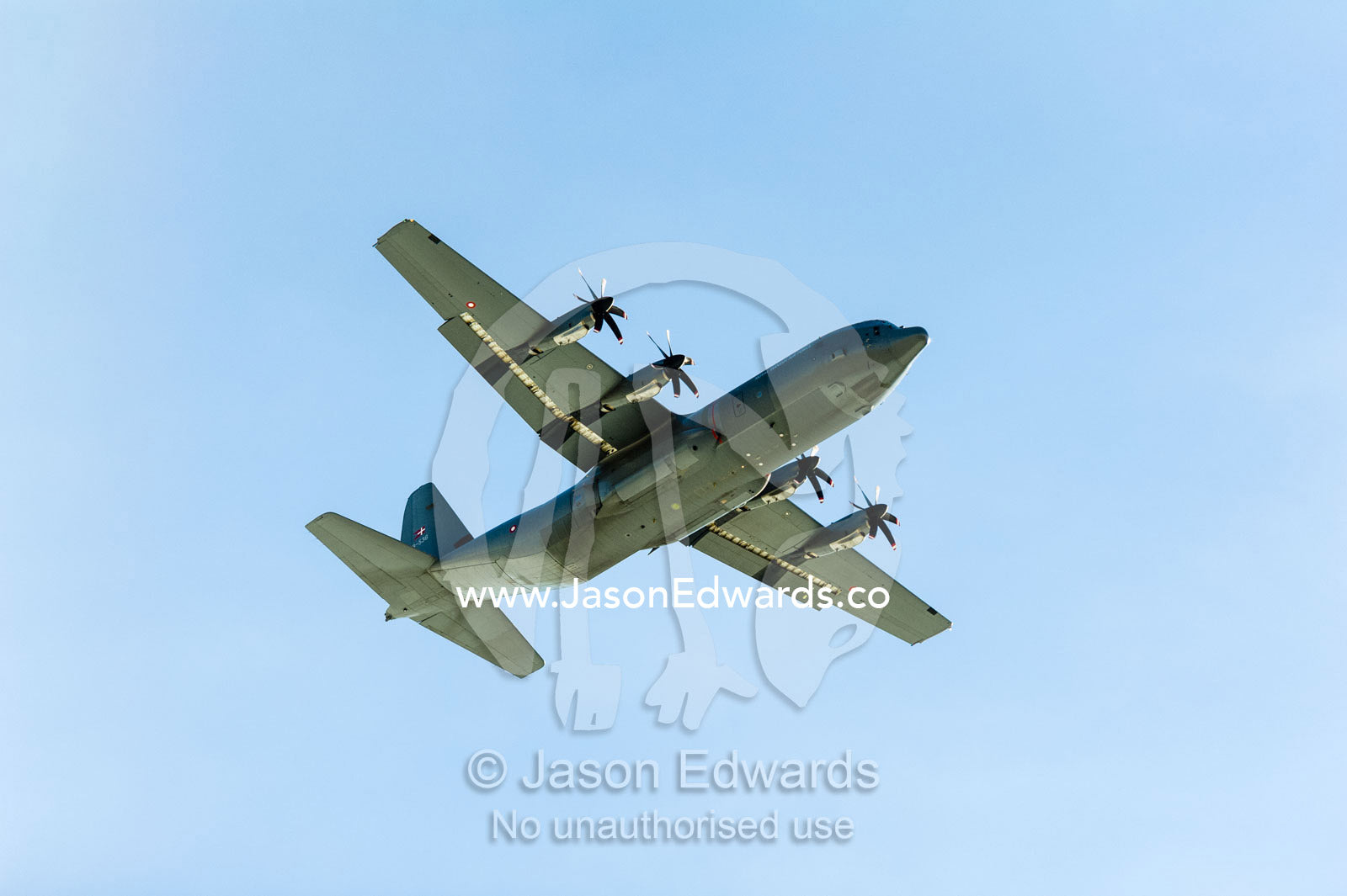 An airforce Hercules aircraft flying over the Greenland Ice Sheet. Russell Glacier, Greenland Ice Sheet, Qeqqata Municipality, Kangerlussuaq, Greenland.