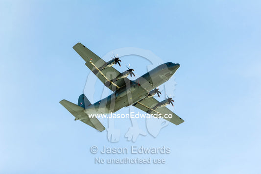 An airforce Hercules aircraft flying over the Greenland Ice Sheet. Russell Glacier, Greenland Ice Sheet, Qeqqata Municipality, Kangerlussuaq, Greenland.