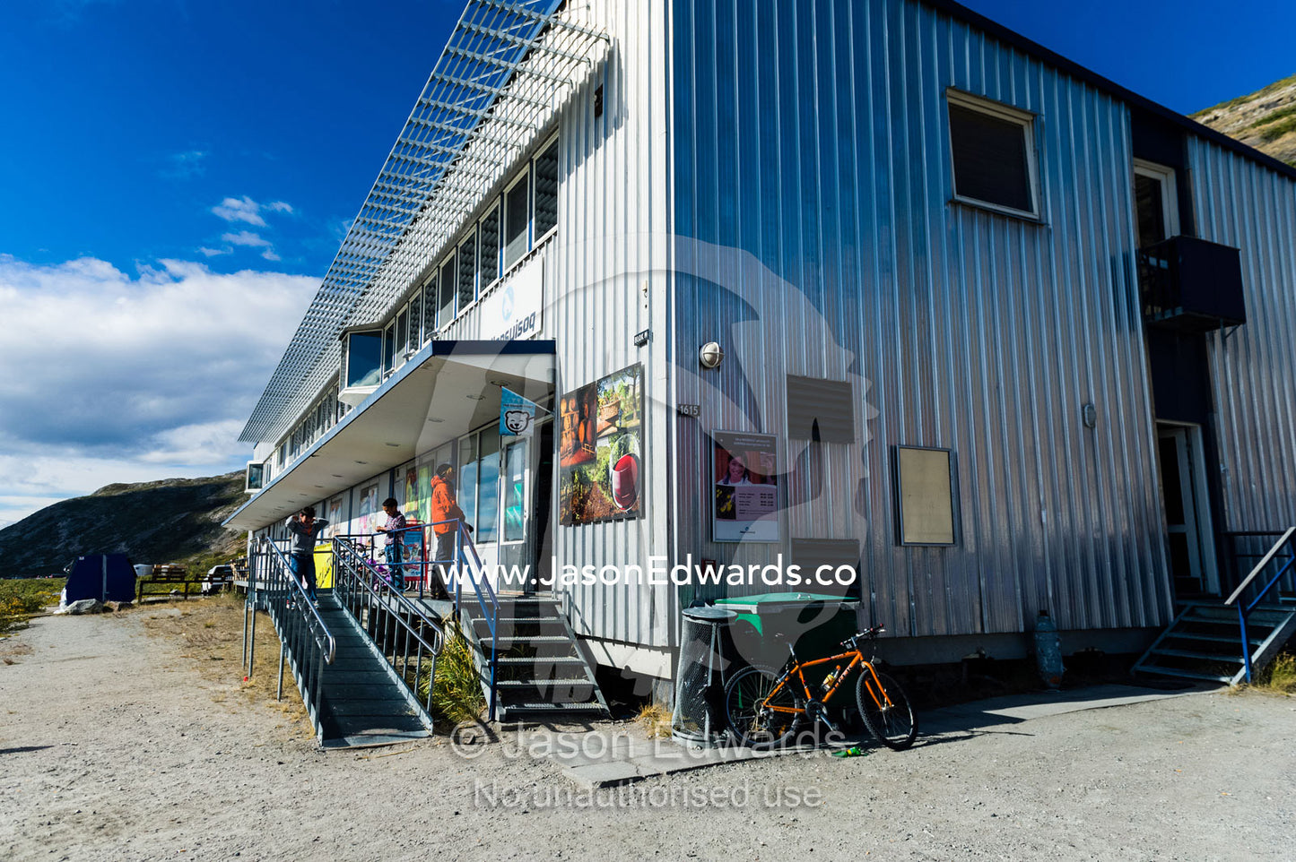 The steel facade of a supermarket and general store in an arctic village. Kangerlussuaq, Qeqqata Municipality, Greenland.