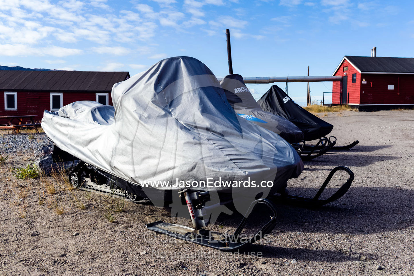 A skiddoo under a cover for the summer months. Kangerlussuaq, Qeqqata Municipality, Greenland.