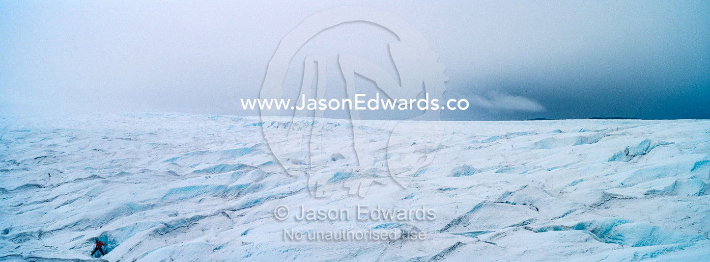 The frozen and barren wasteland of folded ice on the surface of the Greenland Ice Sheet. Greenland Ice Sheet, Qeqqata Municipality, Kangerlussuaq, Greenland.