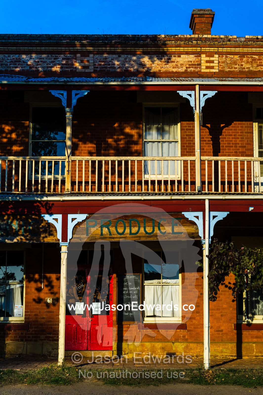 The facade and balcony of a general store in a rural country town. Campbells Creek, Castlemaine, Victoria, Australia.