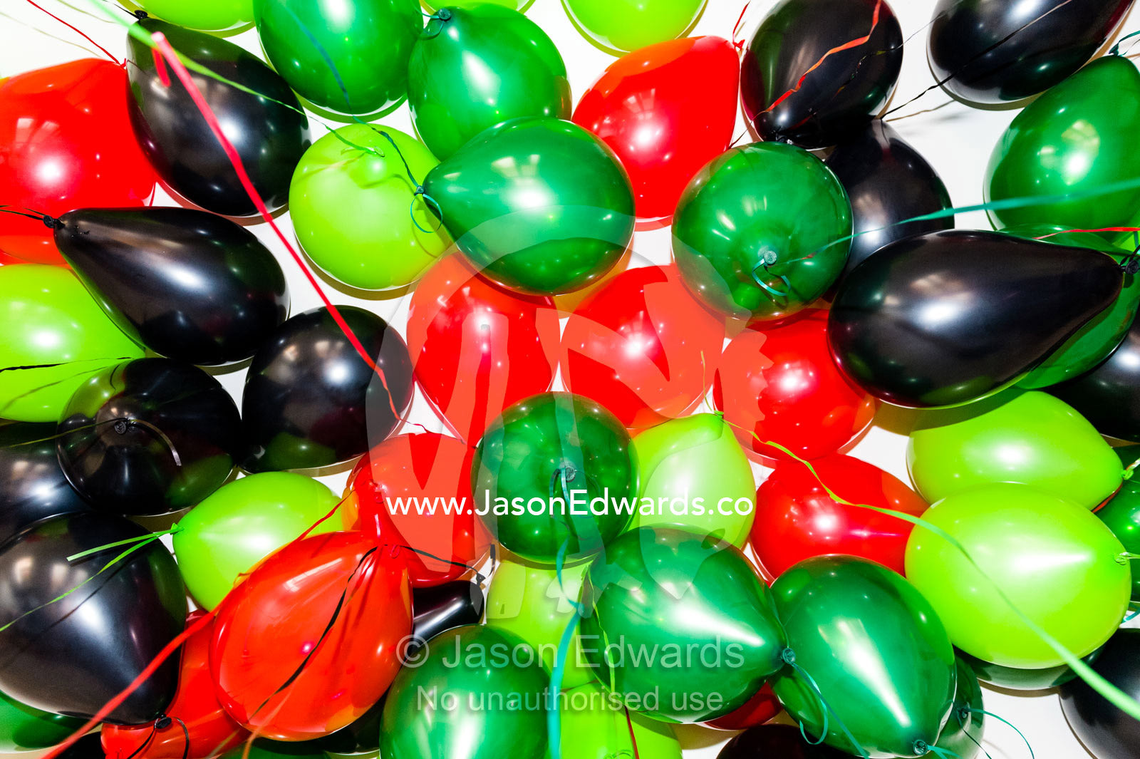 A living room ceiling covered in party balloons. Carlton North, Melbourne, Victoria, Australia.