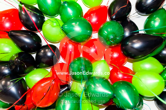 A living room ceiling covered in party balloons. Carlton North, Melbourne, Victoria, Australia.