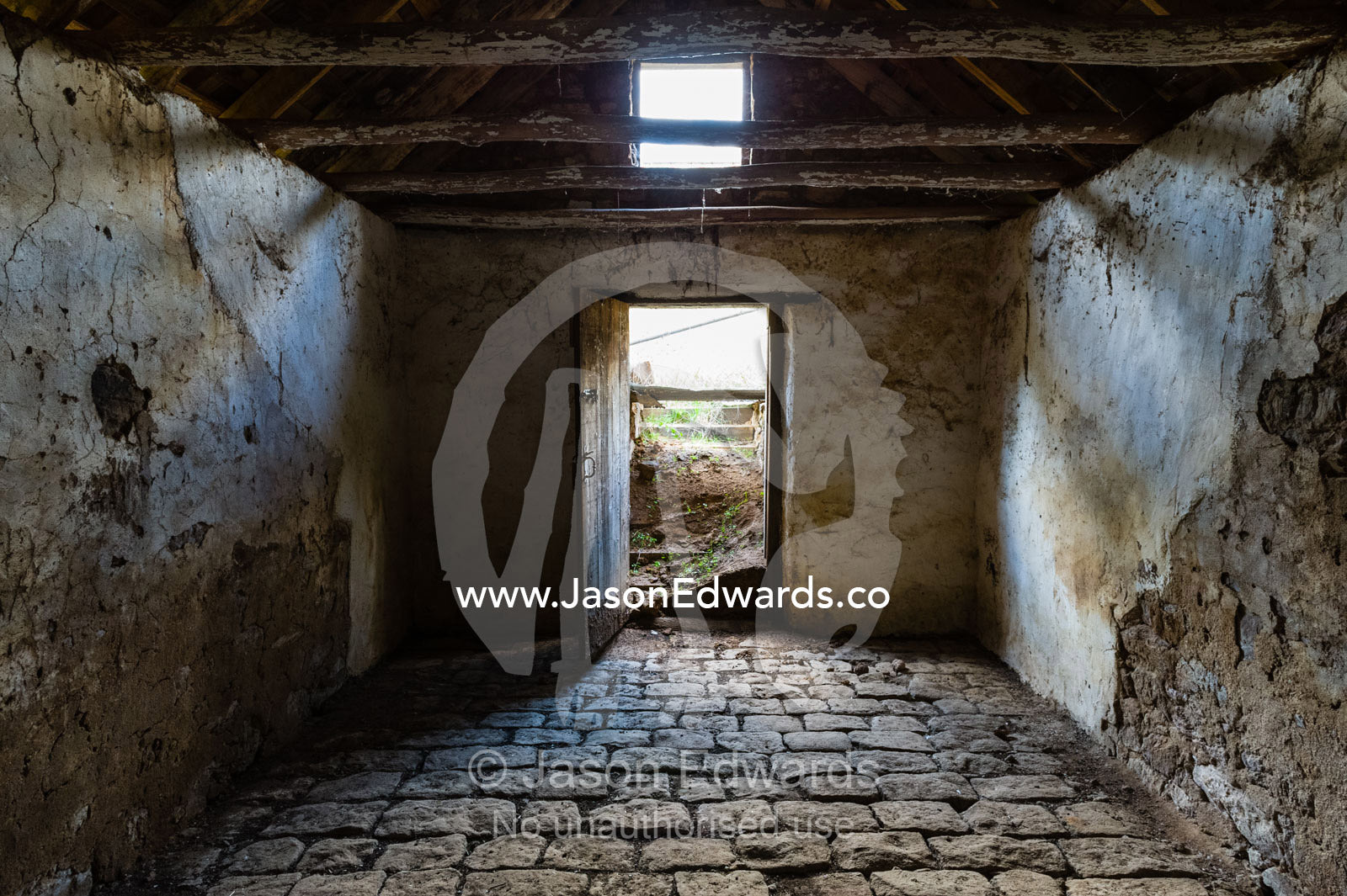 A 19th century grain storage shed built from locally quarried stones and timber. Faithfuls Creek Grain Storage, Euroa, Balmattum, Strathbogie, Victoria, Australia.
