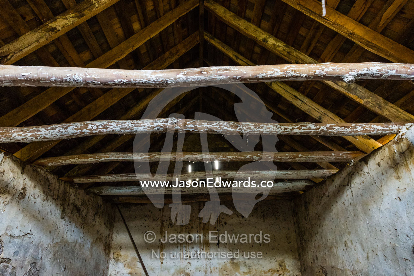 The ceiling rafters of a 19th century grain storage shed built from locally quarried stones and timber. Faithfuls Creek Grain Storage, Euroa, Balmattum, Strathbogie, Victoria, Australia.