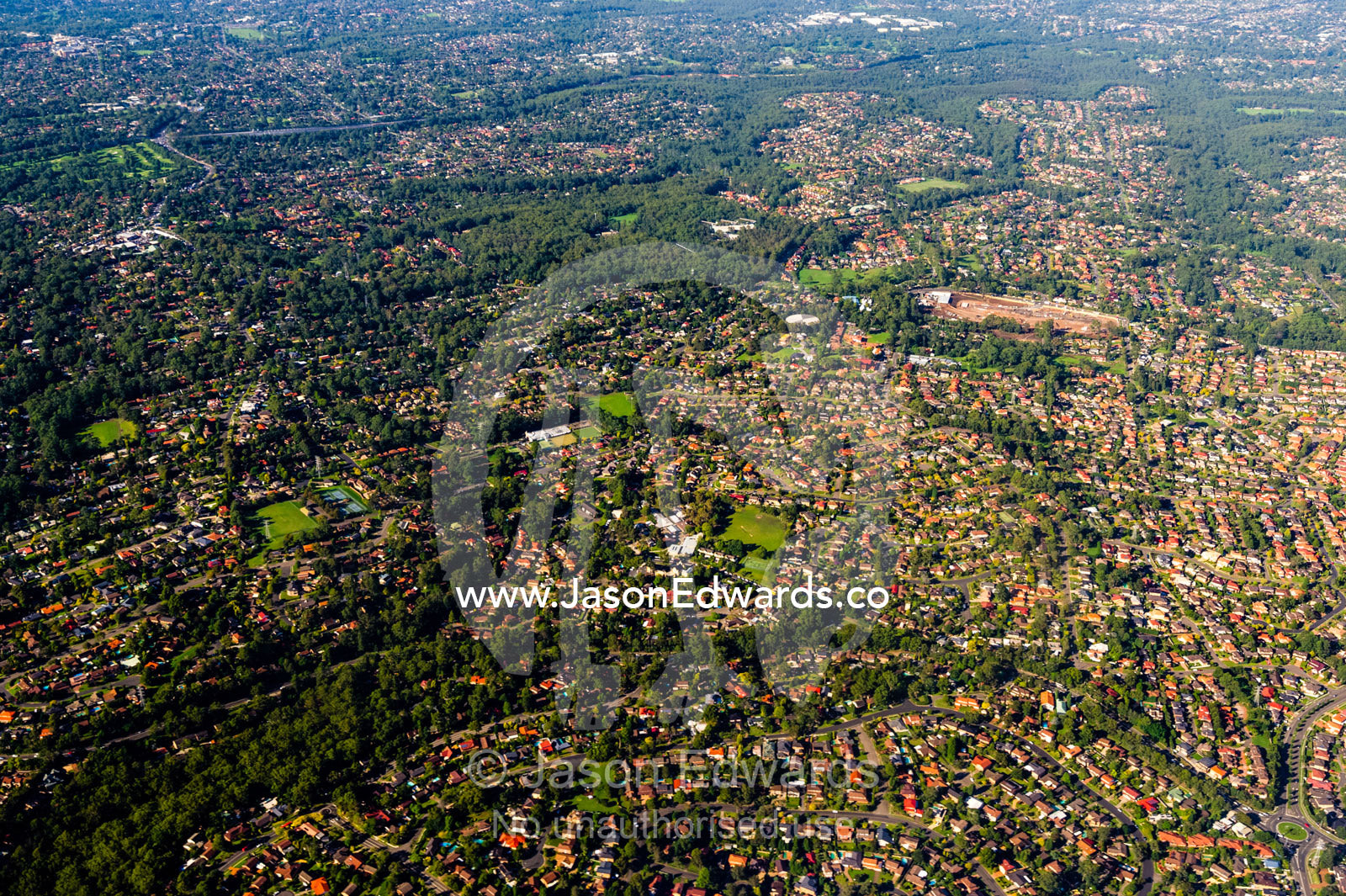 The rooftops of sprawling suburbs surrounding Sydney. Sydney, New South Wales, Australia.