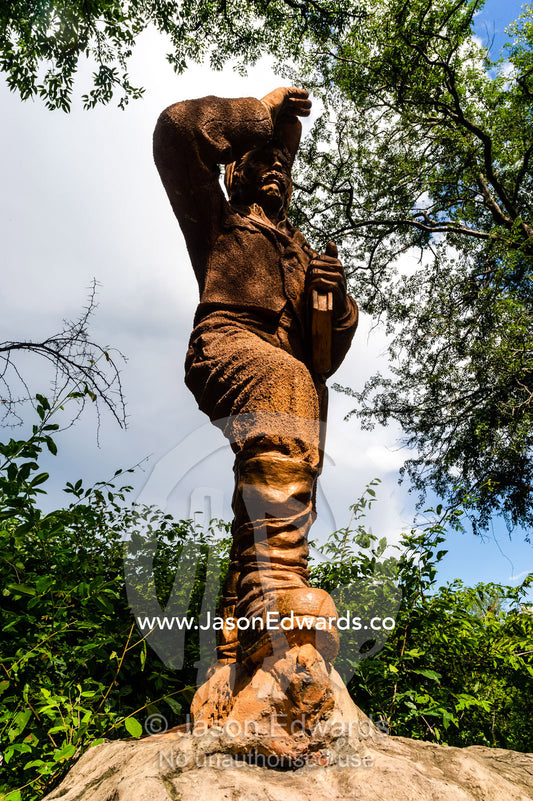 A statue of David Livingstone the explorer on the Zambian side of Victoria Falls. Victoria Falls, Mosi-oa-Tunya National Park, Zambia.