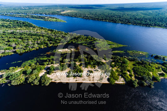 An aerial view of a sand island in the Zambezi River. Zambezi River, Mosi-oa-Tunya National Park, Victoria Falls National Park, Zambia.