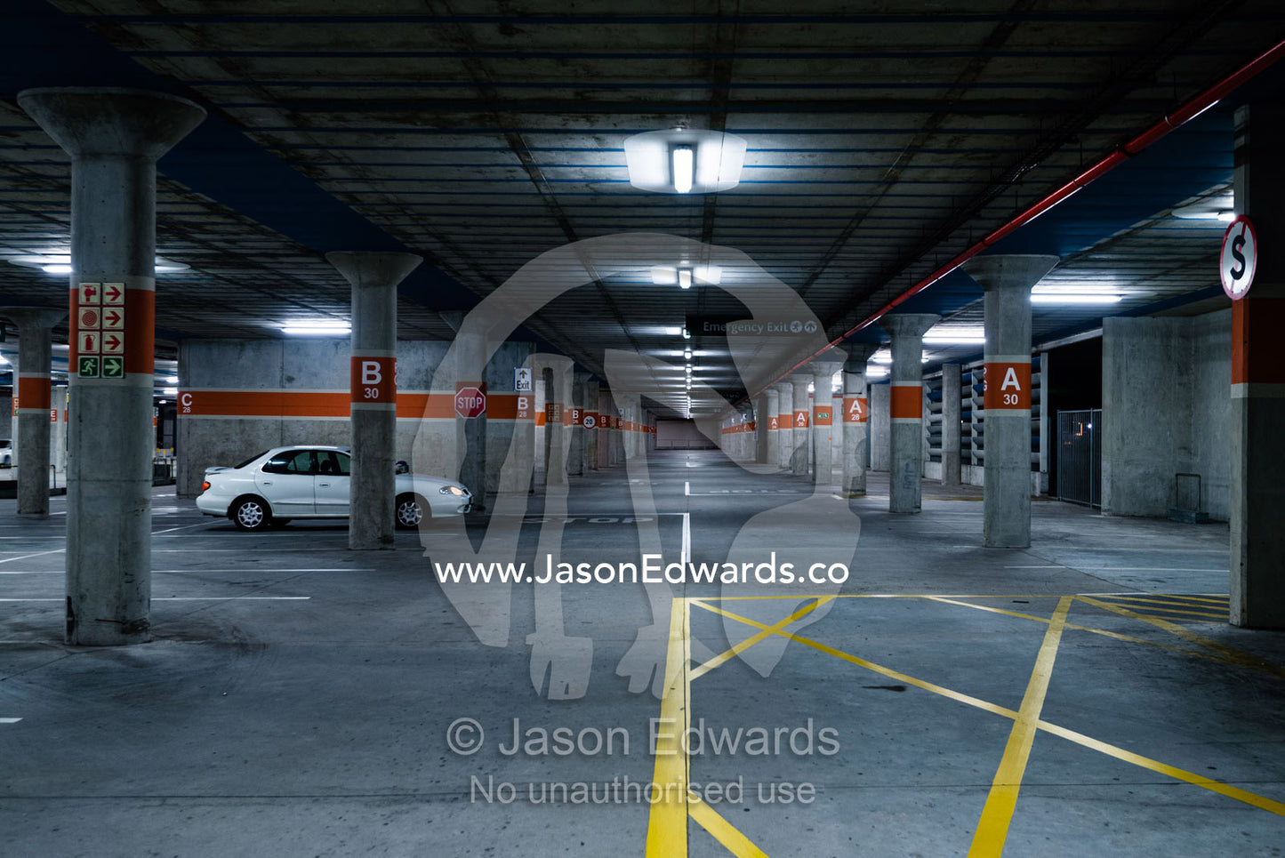 An empty concrete car park at an airport. Cape Town, Western Cape, South Africa.