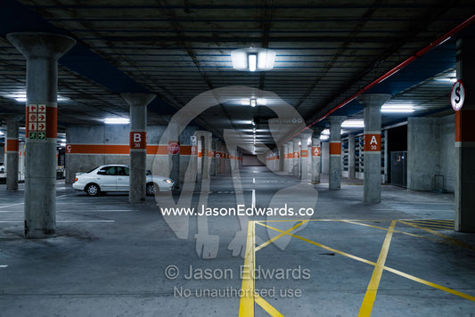An empty concrete car park at an airport. Cape Town, Western Cape, South Africa.