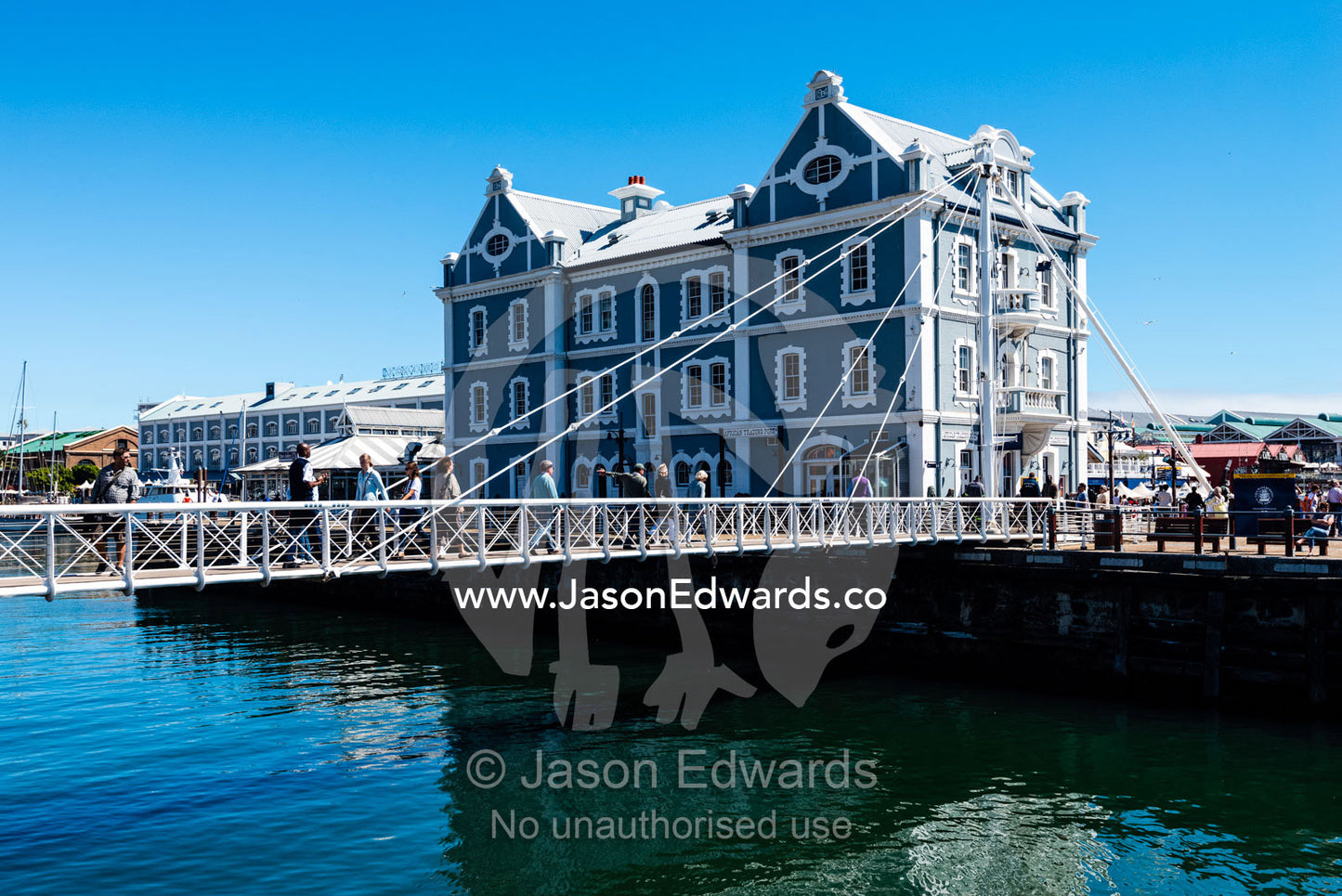 The African Trading Post and foot bridge at the Victoria Wharf Waterfront. Cape Town, Victoria and Alfred Waterfront, Western Cape, South Africa.