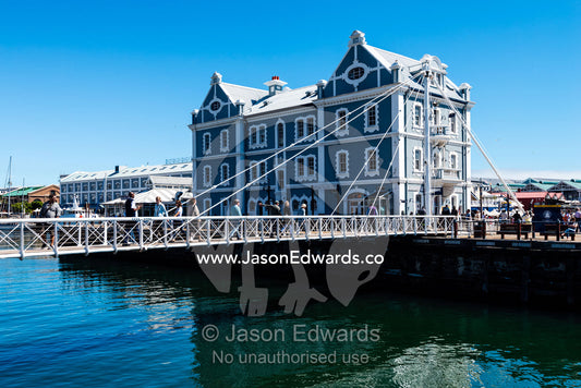 The African Trading Post and foot bridge at the Victoria Wharf Waterfront. Cape Town, Victoria and Alfred Waterfront, Western Cape, South Africa.