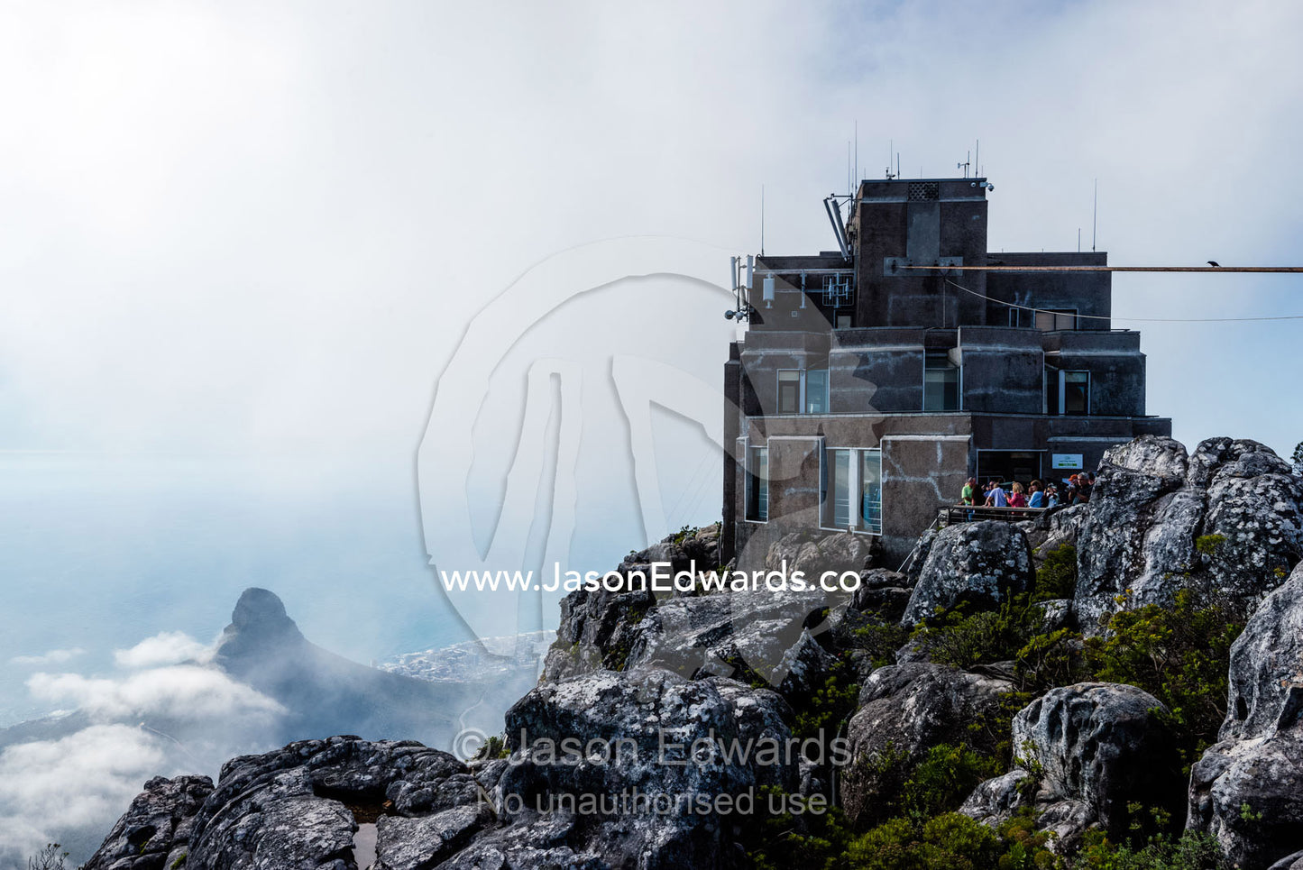 A cable car tower and tourists on top of Table Mountain. Table Mountain, Cape Town, Western Cape, South Africa.