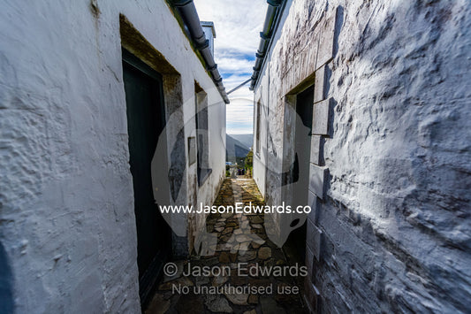 Whitewashed historic buildings at the Cape Point Lighthouse offer a glimpse into bygone maritime era. Cape of Good Hope, Cape Point, Table Mountain National Park, Cape Peninsula, South Africa.