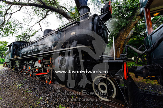 The Princess of Mulobezi 10th Class steam train locomotive engine waiting to transport guests to Victoria Falls. Livingstone, Zambia.