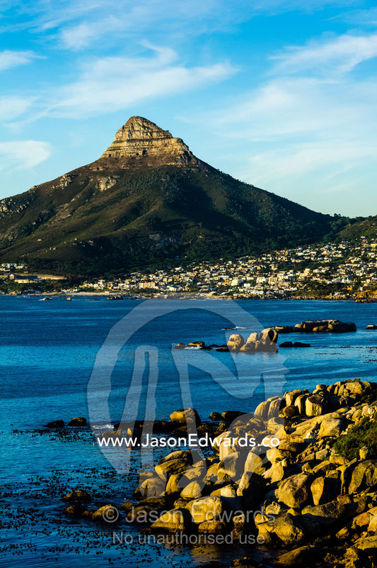Sunset falls on Cape Town and the Lion's Head overlooking Table Bay. Lion's Head, Cape Town, Western Cape, South Africa.