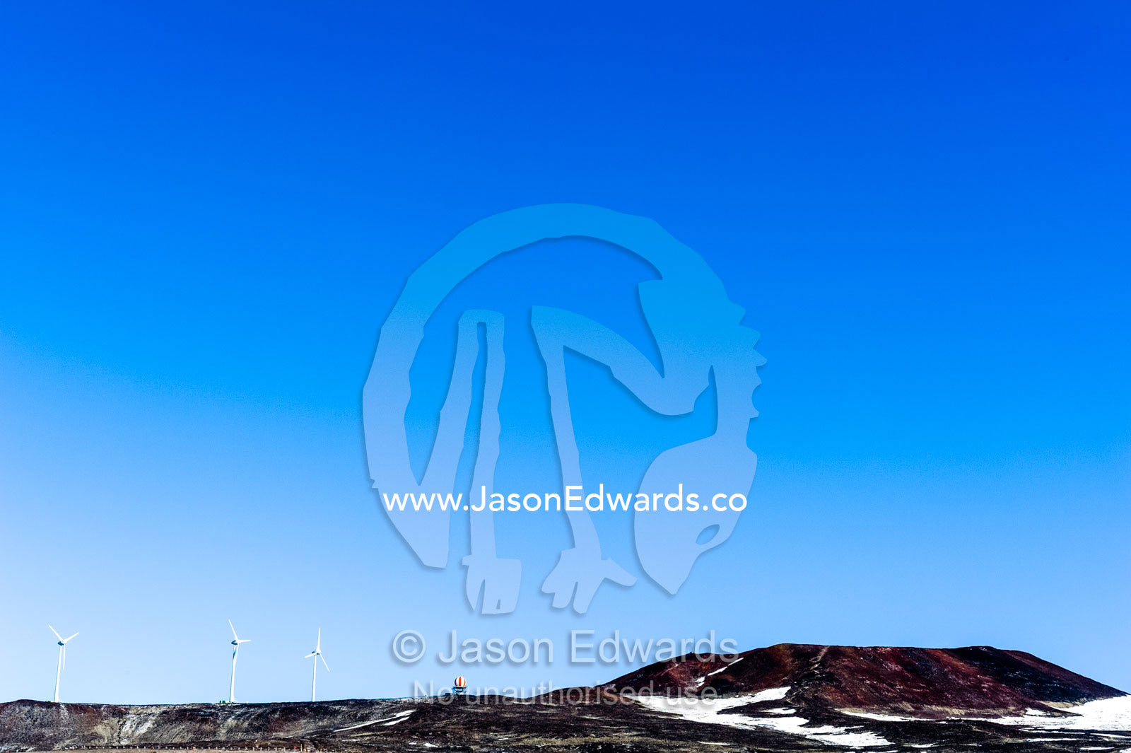 Wind turbines on a barren volcanic hill in Antarctica Crater Hill, Scott Base, Pram Point, Ross Island, Antarctica