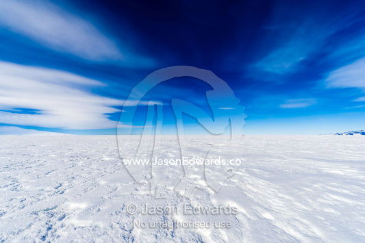 Blue sky above a vast snow plain on top of the Ross Ice Shelf. Windless Bight, Ross Ice Shelf, Ross Island, Antarctica
