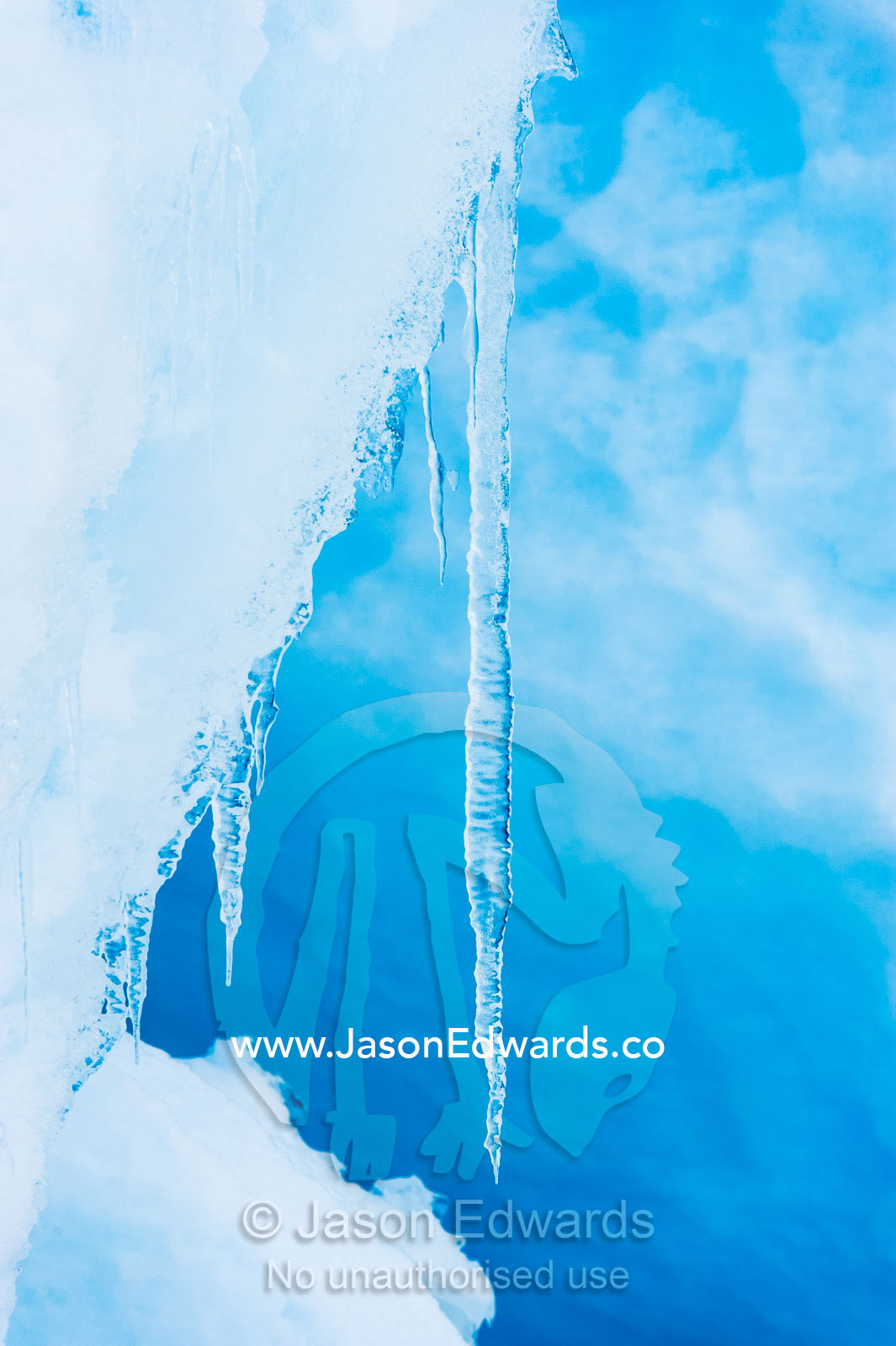 A transparent icicle hanging from a pressure ridge in the sea ice. Turtle Rock, Erebus Bay, McMurdo Sound, Ross Island, Antarctica