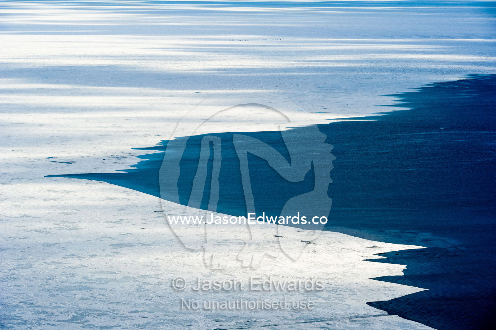 The melting edge of sea ice where it meets the open ocean during the Antarctic summer. Haskell Strait, McMurdo Sound, Ross Sea, Ross Island, Antarctica