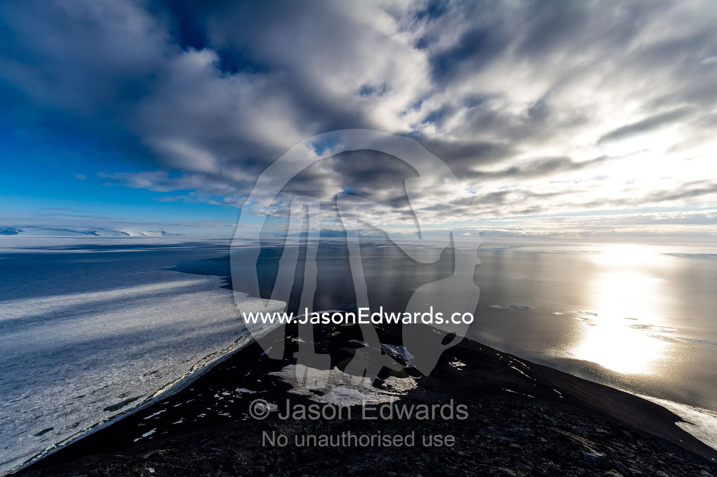 Melting sea ice and the open ocean from a mountain top. Observation Hill, McMurdo Sound, Ross Island, Antarctica