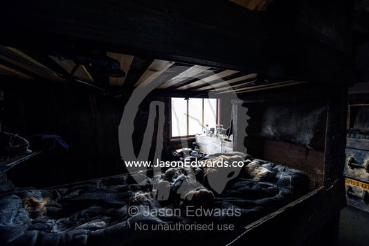 The private sleeping quarters and fur bed covers in the hut of Antarctic explorer Robert Falcon Scott. Scott's Hut, Cape Evans, Ross Island, Antarctica