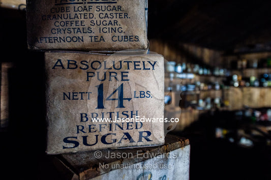 Sugar boxes stacked in the kitchen of the hut of Antarctic explorer Robert Falcon Scott. Scott's Hut, Cape Evans, Ross Island, Antarctica.