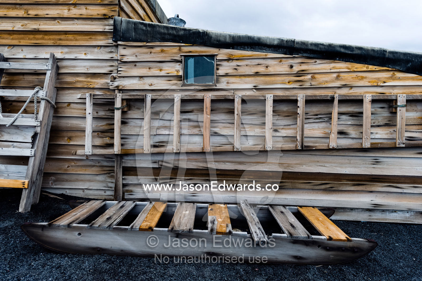 A weathered timber sled and ladder at the Antarctic explorer Robert Falcon Scott's hut. Scott's Hut, Cape Evans, Ross Island, Antarctica.