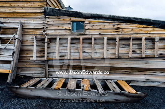 A weathered timber sled and ladder at the Antarctic explorer Robert Falcon Scott's hut. Scott's Hut, Cape Evans, Ross Island, Antarctica.