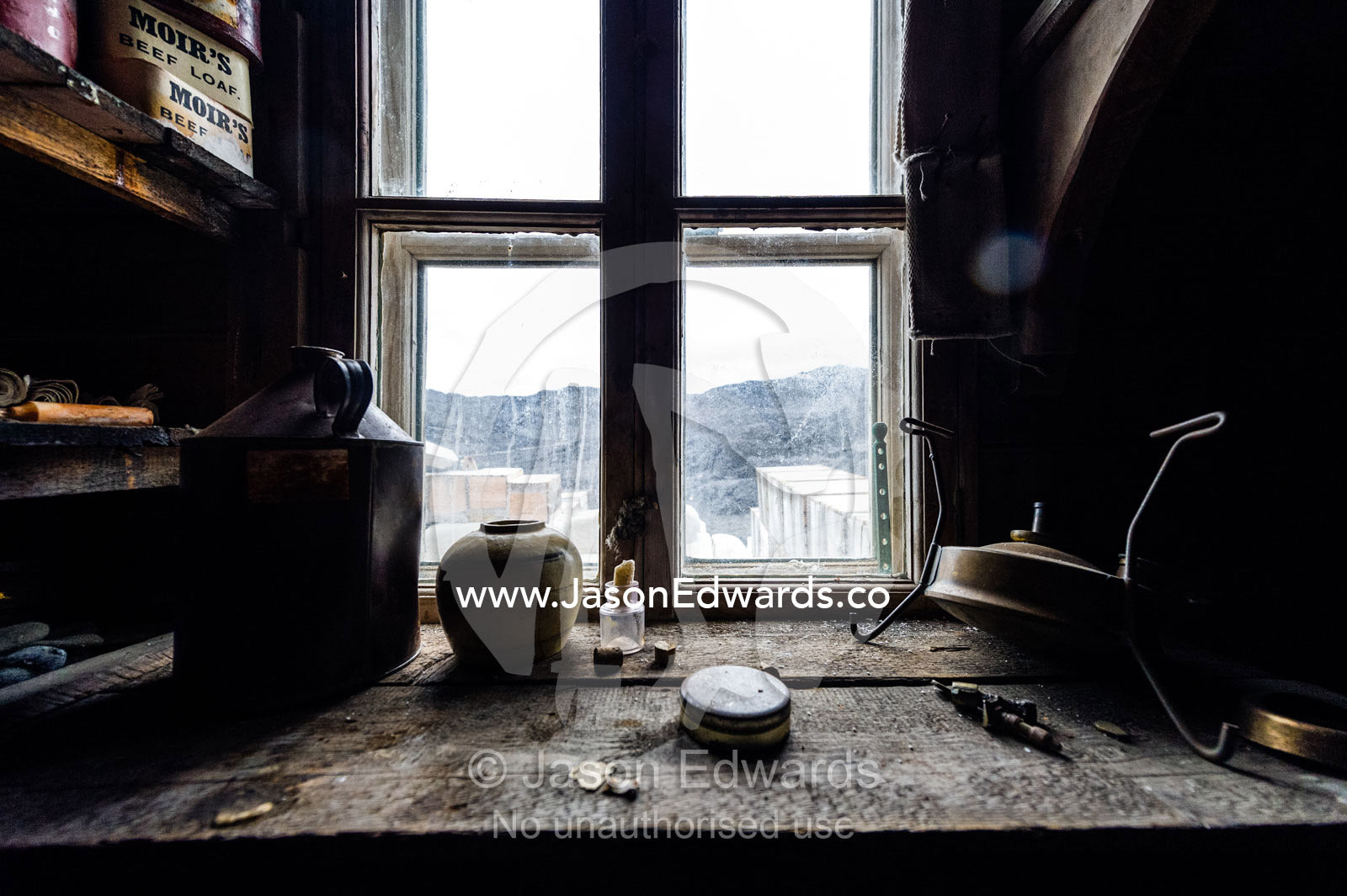 Artifacts and memorabilia on a windowsill in Antarctic explorer Ernest Shackleton's hut. Shackleton's Hut, Cape Royds, Ross Island, Antarctica.