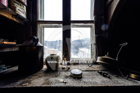 Artifacts and memorabilia on a windowsill in Antarctic explorer Ernest Shackleton's hut. Shackleton's Hut, Cape Royds, Ross Island, Antarctica.