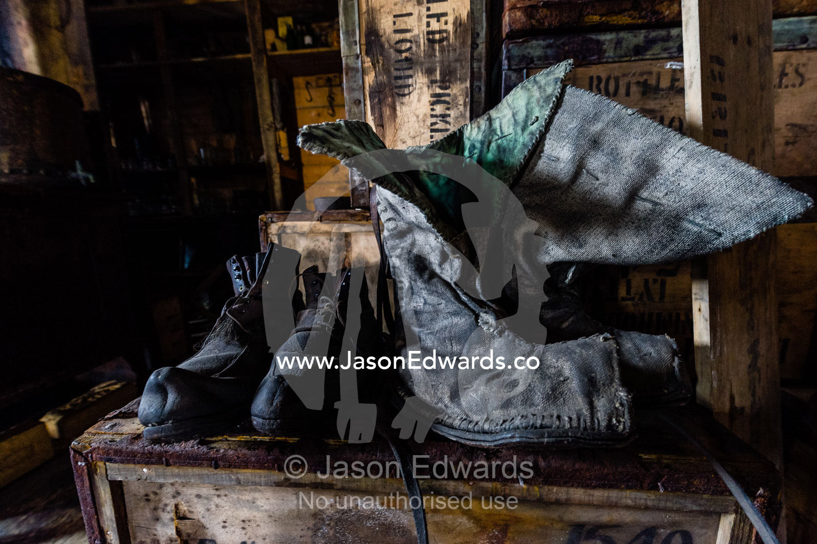 Unlaced leather boots in Antarctic explorer Ernest Shackelton's hut. Shackleton's Hut, Cape Royds, Ross Island, Antarctica.