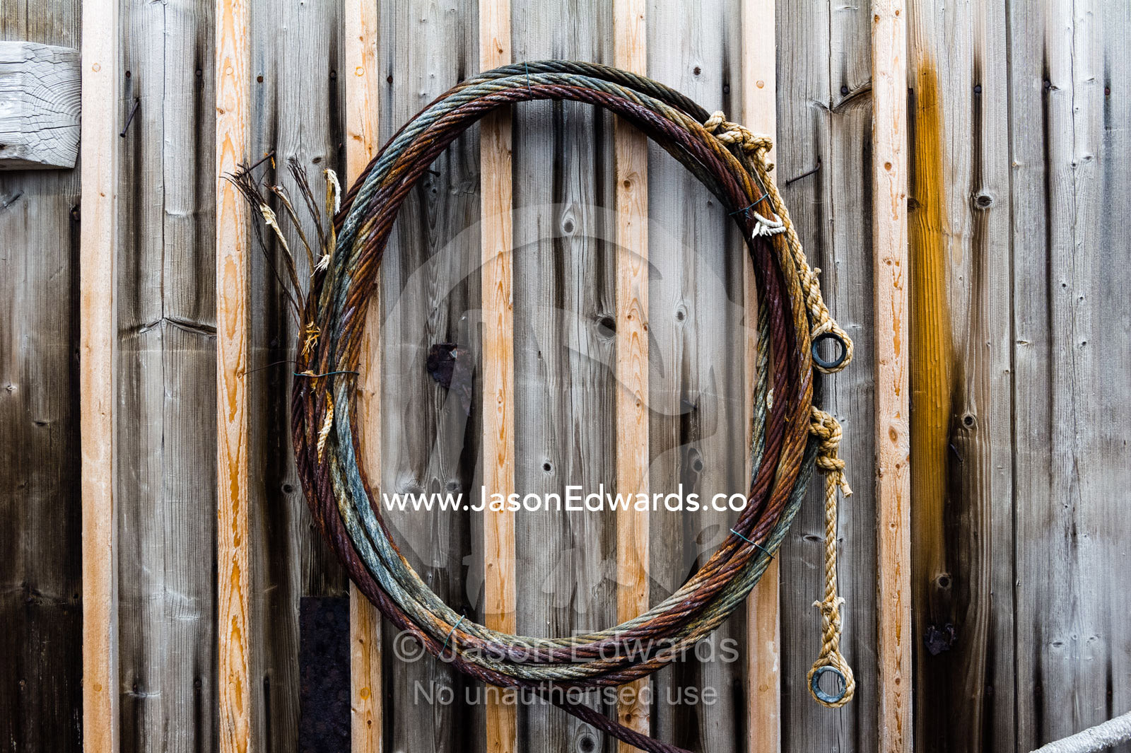 A steel cable hanging on the weathered timber walls of the Antarctic explorer Ernest Shackleton's hut. Shackleton's Hut, Cape Royds, Ross Island, Antarctica.