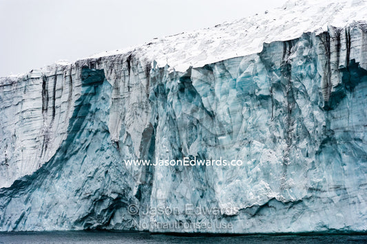 The tortured ice fracture zone of a glacier above the ocean. Cape Bird Ice Cap, Adelie Glacier, Cape Bird, Ross Island, Antarctica.