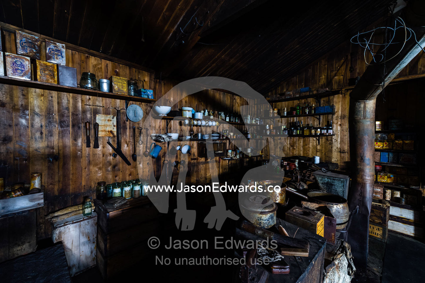 Plates, cups and kitchen utensils in the hut of Antarctic explorer Robert Falcon Scott. Scott's Hut, Cape Evans, Ross Island, Antarctica.
