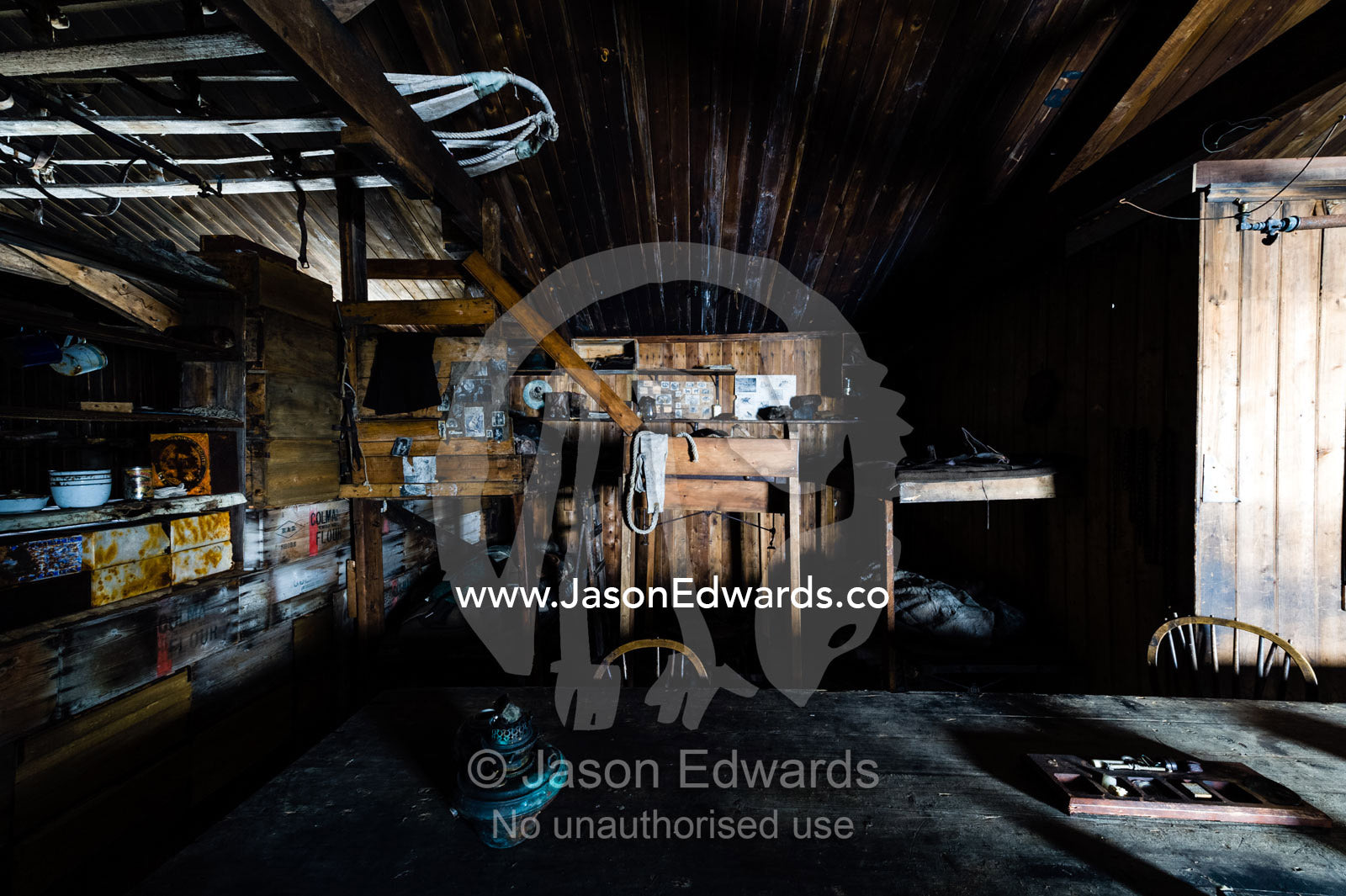 A bunkroom next to the wardroom table in the Antarctic explorer Robert Falcon Scott's hut. Scott's Hut, Cape Evans, Ross Island, Antarctica.