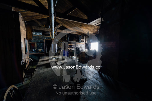 The wardroom table in the Antarctic explorer Robert Falcon Scott's hut. Scott's Hut, Cape Evans, Ross Island, Antarctica.