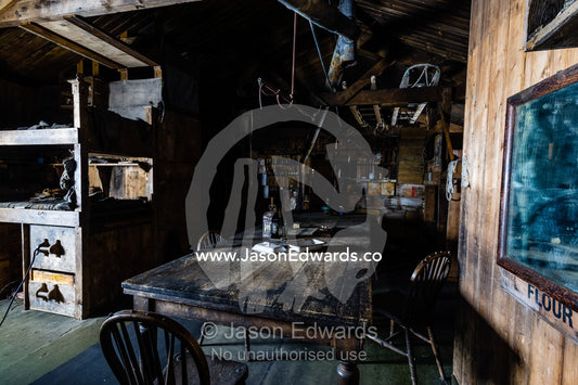 The wardroom table in the Antarctic explorer Robert Falcon Scott's hut. Scott's Hut, Cape Evans, Ross Island, Antarctica.