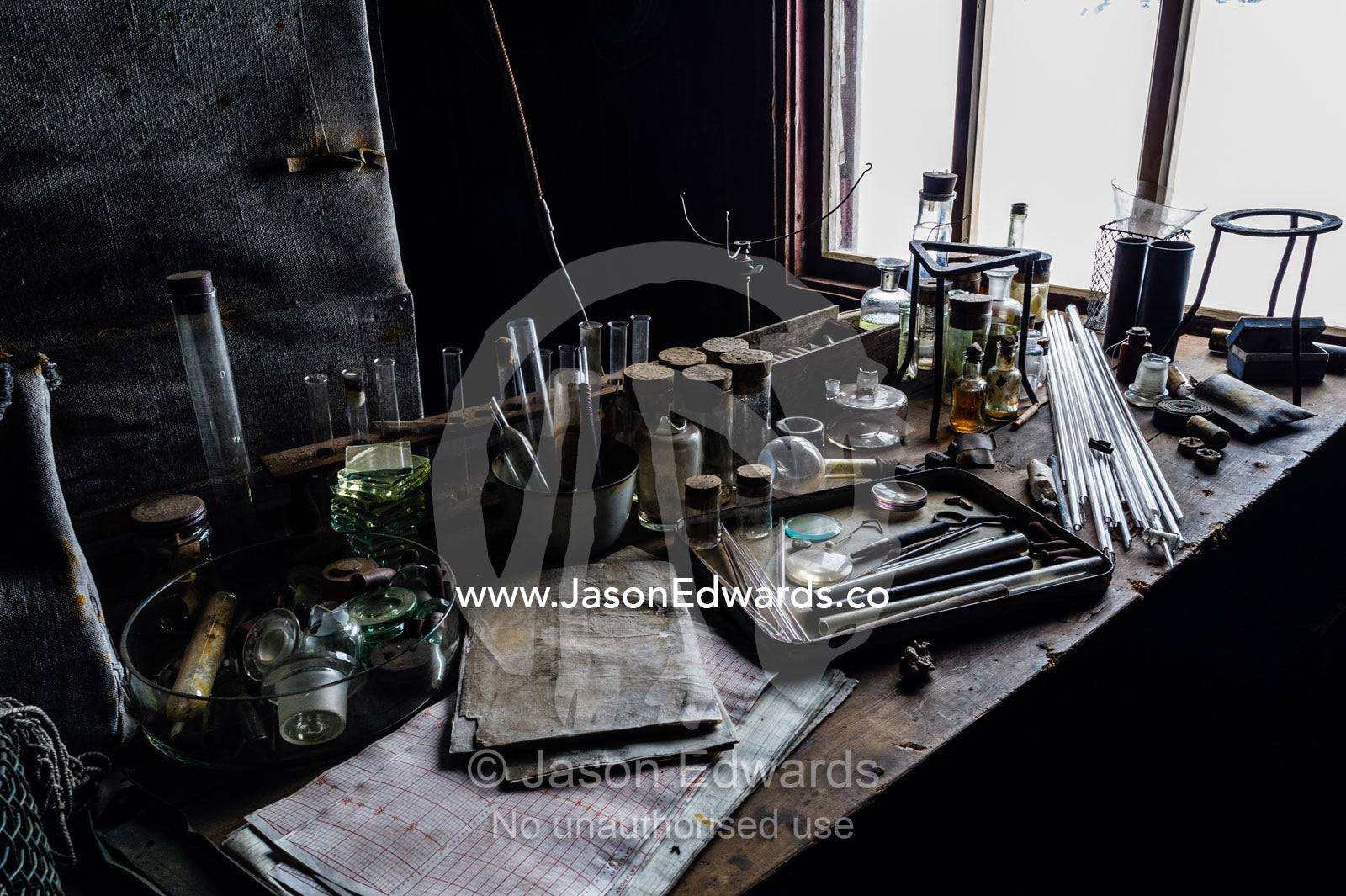 Glass pipettes, beakers and other scientific experiment equipment in the hut of Antarctic explorer Robert Falcon Scott. Scott's Hut, Cape Evans, Ross Island, Antarctica.