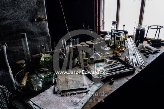 Glass pipettes, beakers and other scientific experiment equipment in the hut of Antarctic explorer Robert Falcon Scott. Scott's Hut, Cape Evans, Ross Island, Antarctica.