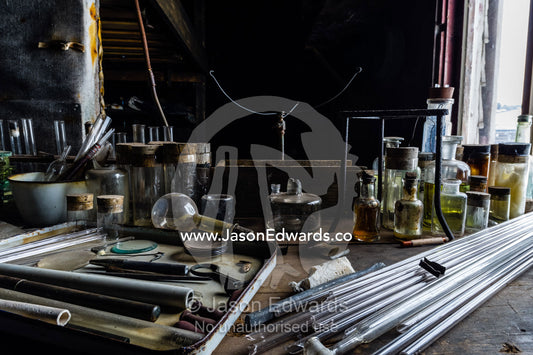 Glass pipettes, beakers and other scientific experiment equipment in the hut of Antarctic explorer Robert Falcon Scott. Scott's Hut, Cape Evans, Ross Island, Antarctica.