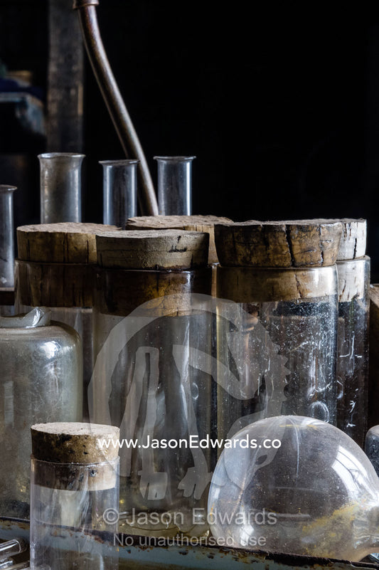 Glass pipettes, beakers and other scientific experiment equipment in the hut of Antarctic explorer Robert Falcon Scott. Scott's Hut, Cape Evans, Ross Island, Antarctica.