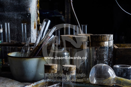 Glass pipettes, beakers and other scientific experiment equipment in the hut of Antarctic explorer Robert Falcon Scott. Scott's Hut, Cape Evans, Ross Island, Antarctica.