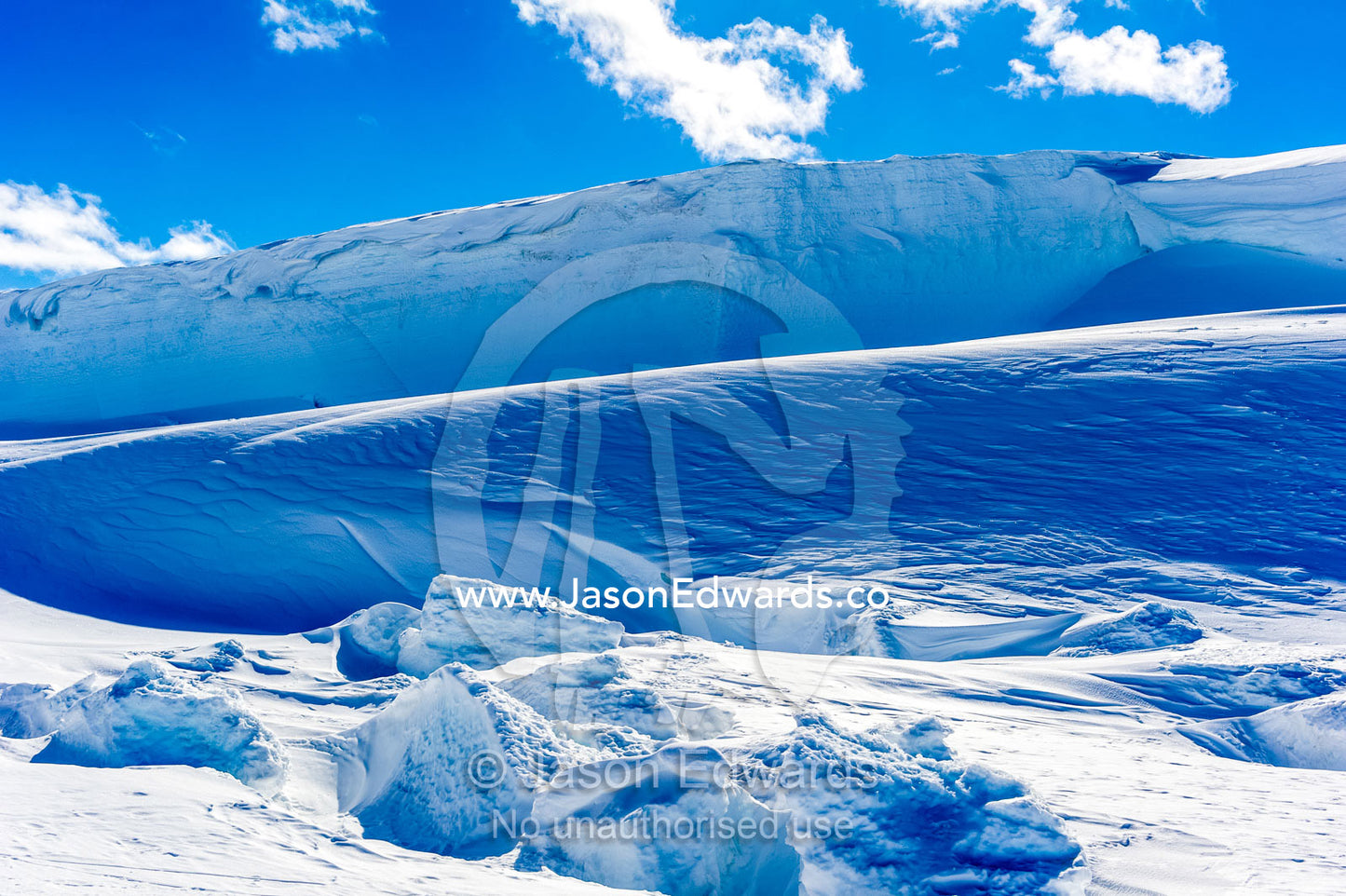 The sheer cliffs of the Erebus glacier tongue in Antarctica. Erebus Ice Caves, Mount Erebus, Ross Island, Antarctica.