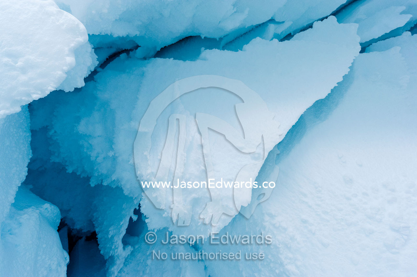 The frozen ceiling and icy walls of an ice cave in the Erebus Glacier Tongue. Erebus Ice Caves, Mount Erebus, Ross Island, Antarctica.