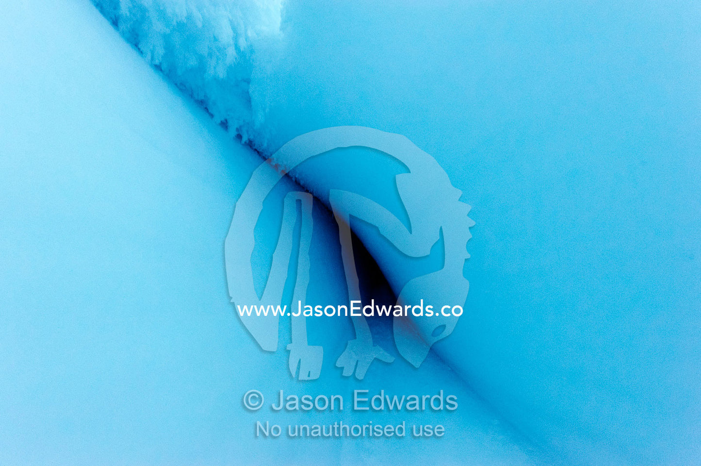 The frozen ceiling and icy walls of an ice cave in the Erebus Glacier Tongue. Erebus Ice Caves, Mount Erebus, Ross Island, Antarctica.