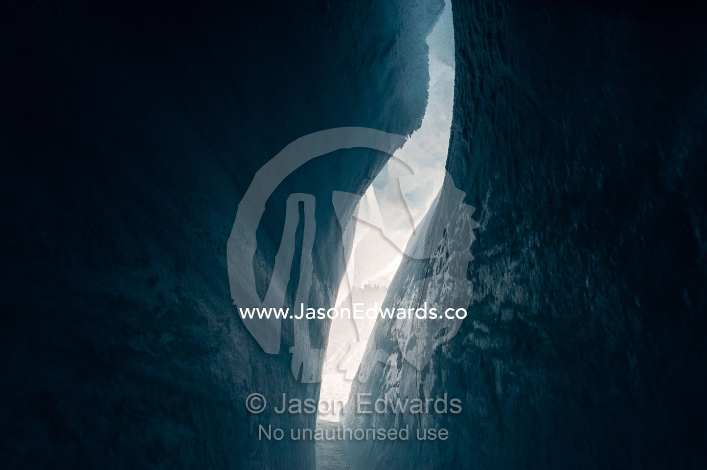 The frozen ceiling and icy walls of an ice cave in the Erebus Glacier Tongue. Erebus Ice Caves, Mount Erebus, Ross Island, Antarctica.